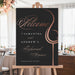 rehearsal dinner welcome sign with elegant wine glass design on black background