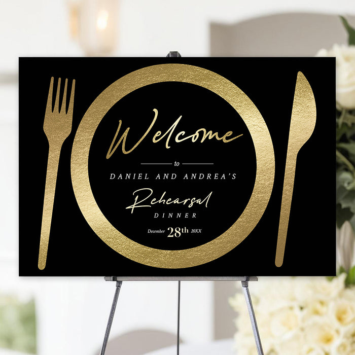 Black and gold rehearsal dinner welcome sign with elegant plate and cutlery design