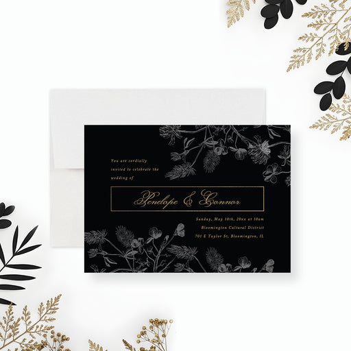 Black and gold floral wedding invitation with elegant vintage foliage design-front