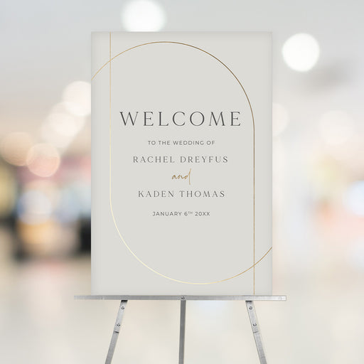 Custom wedding welcome sign with arch design, gold accents, and neutral tones, personalized with couple's names and date.