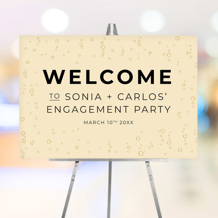 Champagne-themed engagement party welcome sign with a bubbly champagne background and customizable name and date for birthdays and other celebrations.