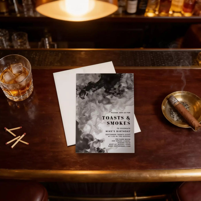 a birthday party invitation for Mike's 21st birthday, with a black and white design and text. The invitation is placed on a wooden table with a glass of whiskey, a lit cigar, and a matchbox nearby.