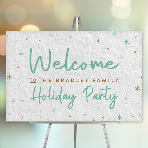 Custom holiday welcome sign with blue and gold snowflakes on snowy white background for Christmas parties