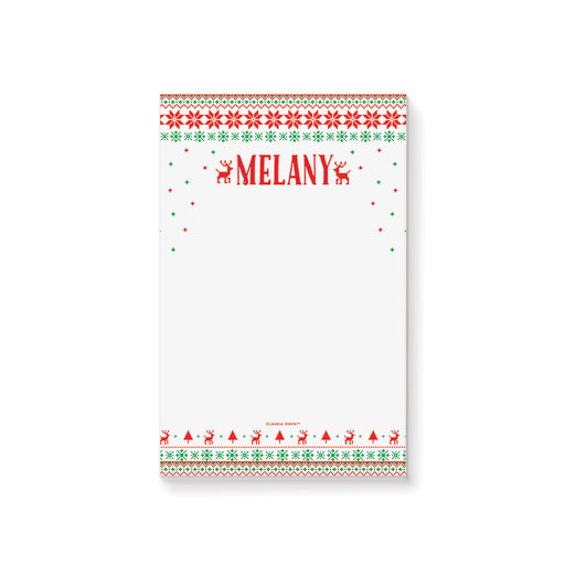 Personalized holiday notepad featuring a red and green Christmas sweater border, reindeer and snowflake designs, with a custom printed name at the top.