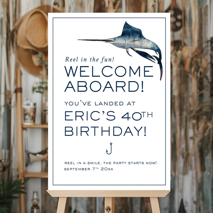 fishing birthday welcome sign with marlin illustration, navy nautical details, hook icon, and personalized birthday party wording on an easel