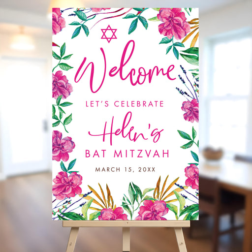 Floral Bat Mitzvah welcome sign featuring pink botanical design and Star of David, displayed on an easel for Jewish event entrance decor.