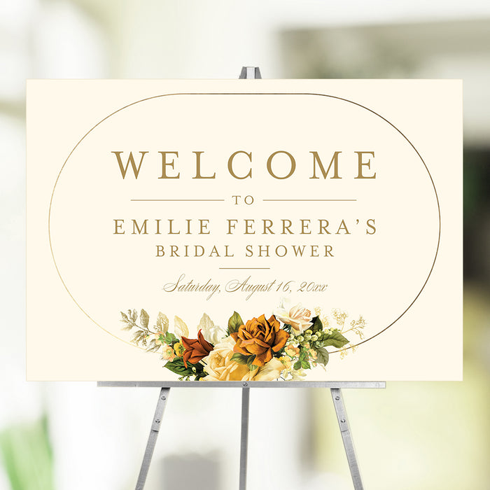 Floral bridal shower welcome sign featuring a vintage flower arrangement in an elegant gold frame