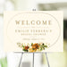Floral bridal shower welcome sign featuring a vintage flower arrangement in an elegant gold frame