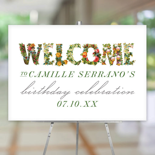 Personalized floral birthday welcome sign featuring vibrant flower-filled "WELCOME" text and green script accents. 