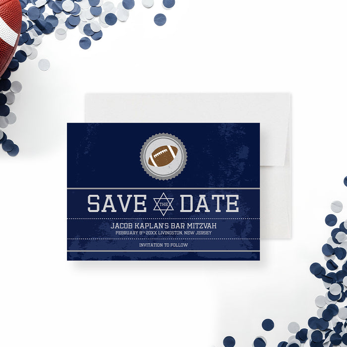 Navy blue football save the date card with a brown football icon and a Star of David for a Bar Mitzvah sports-themed celebration-front