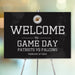 Football game day welcome sign used as a sports party entrance sign