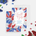Personalized 4th of July invitation featuring red, white, and blue flowers for Independence Day celebrations-front-back