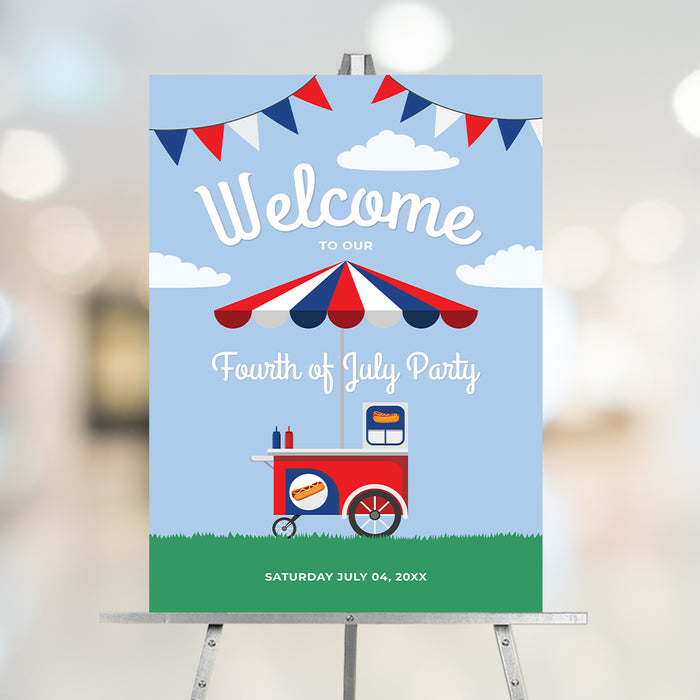 Fourth of July welcome sign featuring a hot dog cart and red, white, and blue bunting on a blue sky background