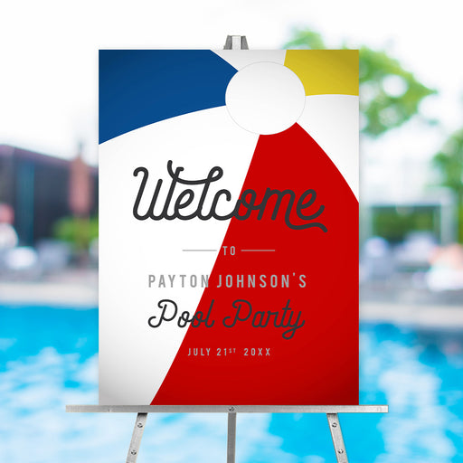 Personalized pool party welcome sign with a colorful beach ball design, featuring a custom name and date, ideal for summer celebrations.