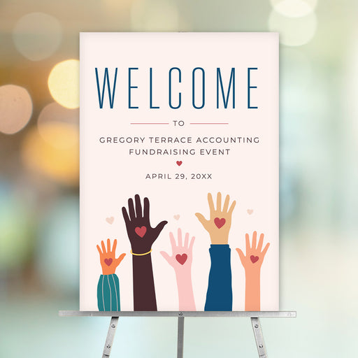 Fundraising event welcome sign featuring diverse raised hands and heart accents, designed as reception signage for charity events.