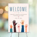Fundraising event welcome sign featuring diverse raised hands and heart accents, designed as reception signage for charity events.