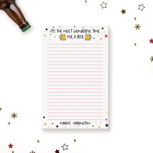 Funny Christmas beer notepad featuring beer mugs and stars. Personalized holiday stationery gift for men who love beer