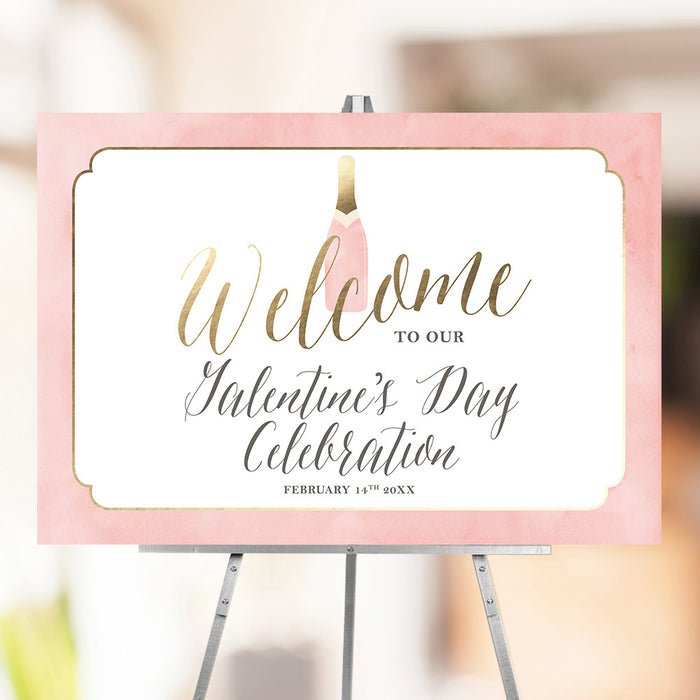 Galentine's Day welcome sign with blush pink background, champagne bottle illustration, elegant lettering, and party date displayed on an easel