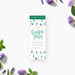 Garden party birthday ticket invitation with purple flowers, green leaves, and floral admit one ticket design.