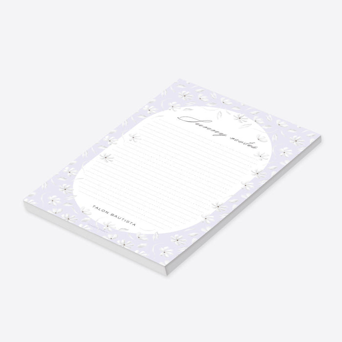 Personalized floral notepad with lavender background, white flowers, dotted writing lines, "Sunny notes" text, and custom name-side