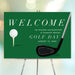Golf welcome sign featuring a green background, golf ball, and club illustration – ideal for entrance displays or decor.