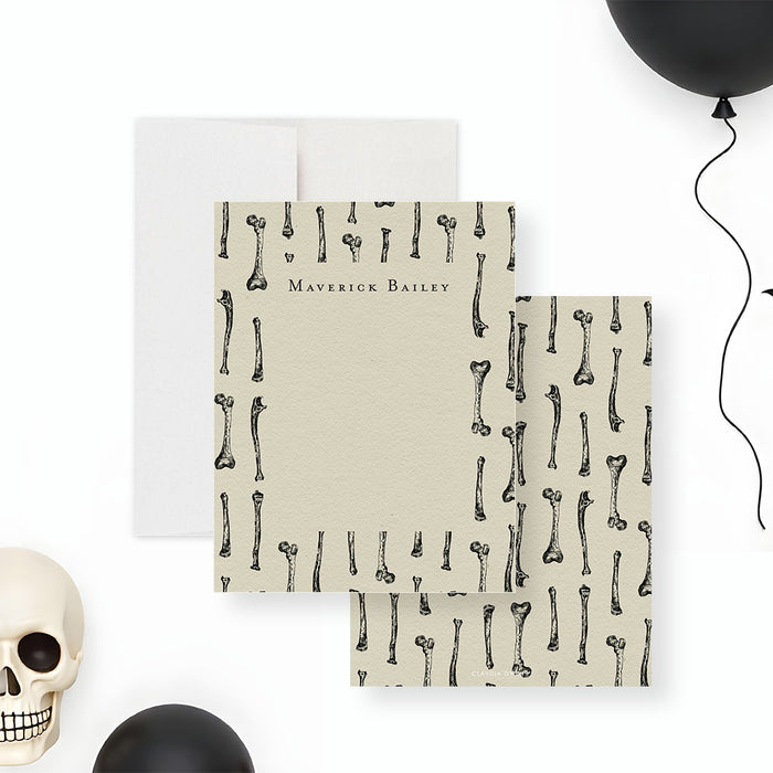 Personalized gothic note card featuring a skeleton bone illustration, perfect for spooky birthday favors or distinctive Halloween thank-you gifts.-front-back