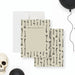 Personalized gothic note card featuring a skeleton bone illustration, perfect for spooky birthday favors or distinctive Halloween thank-you gifts.-front-back