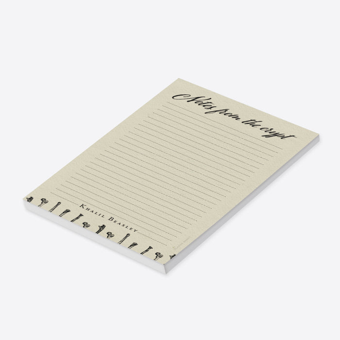 Personalized gothic notepad featuring “Notes from the Crypt” title and bone design, perfect spooky stationery gift.-side