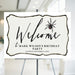Personalized birthday welcome sign featuring a black widow spider, ideal for spooky gothic events.