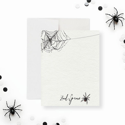 Gothic note card with spider web and black widow illustration, perfect for creepy Halloween stationery or birthday favors.-front