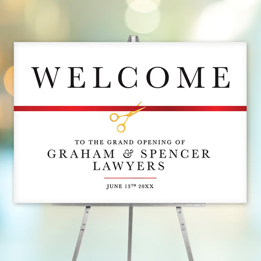 Custom grand opening welcome sign with red ribbon and gold scissors, personalized for business launches or ribbon-cutting ceremonies.