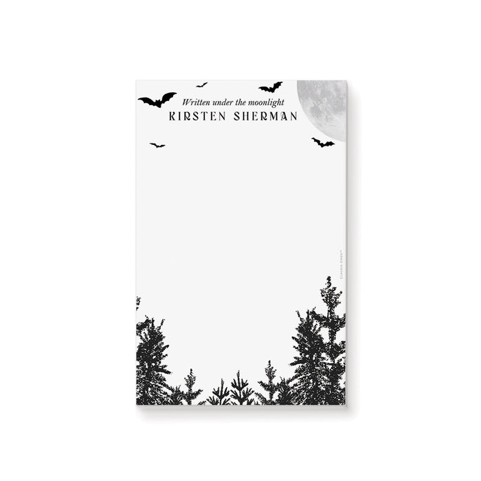 Personalized notepad with "Written under the moonlight" text, full moon and flying bats, and dark forest silhouette for notes, lists, and gifts 