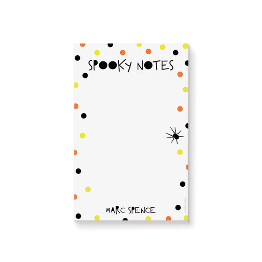 Halloween notepad featuring “Spooky Notes” text, with orange, black, and yellow dots, and a spider illustration.