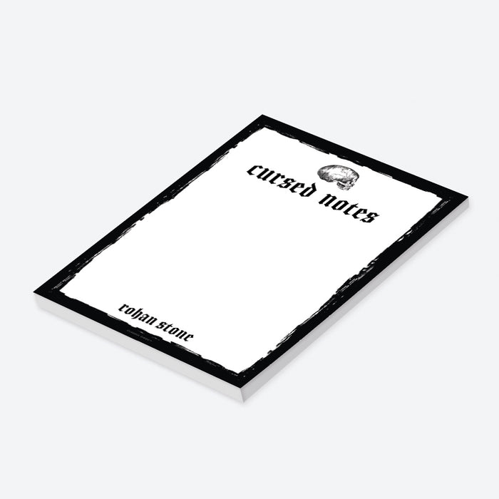 Personalized skull notepad with 'Cursed Notes' text, black border, and vintage gothic style—perfect for spooky journaling or Halloween gifts.-side