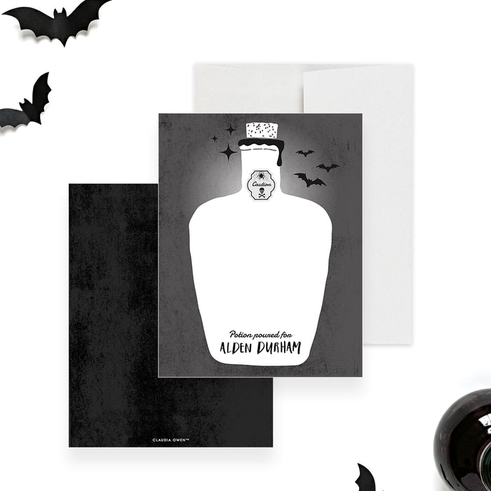 Halloween note card featuring a potion bottle design with bats, a caution label with spider, and skull illustration, perfect for gothic stationery.-front-back