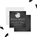 Halloween save the date card with a glowing full moon, flying bat silhouettes, and bold white text on a dark charcoal background-front-back