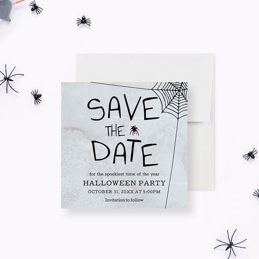 Halloween save the date card with spooky spider web design, gray textured background, and black spider illustrations-front