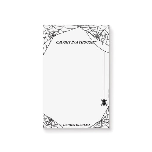Personalized Halloween notepad featuring a minimalist spider web design with black and white spooky theme