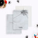 personalized Halloween thank you card with a spooky spider web design, hanging spider, and custom name-front-back