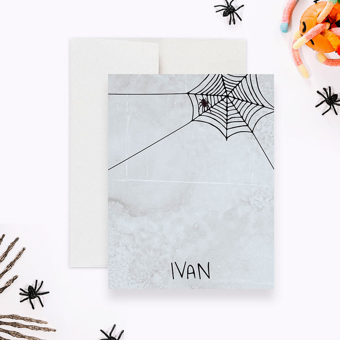 personalized Halloween thank you card with a spooky spider web design, hanging spider, and custom name-front