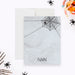 personalized Halloween thank you card with a spooky spider web design, hanging spider, and custom name-front