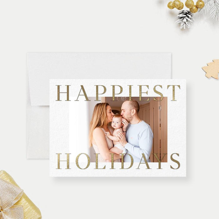 Happiest Holidays Christmas photo card template with gold lettering, a family photo and a white background.