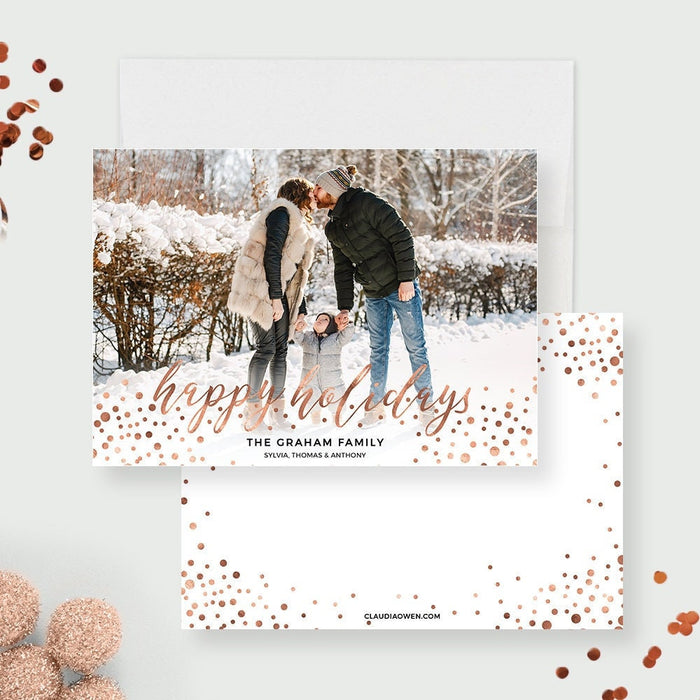 Happy Holidays photo greeting card featuring a winter theme, modern typography and a customizable family photo layout in a printable digital format