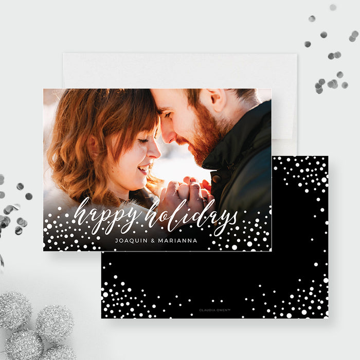 Front and back of the Happy Holidays photo card template, showing a photo front and a black back with snow dots.