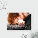 Happy Holidays photo card template with a couple's photo, white script lettering and scattered snow dots.