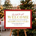 merry girls night holiday welcome sign with elegant gold lettering on red and white festive party décor