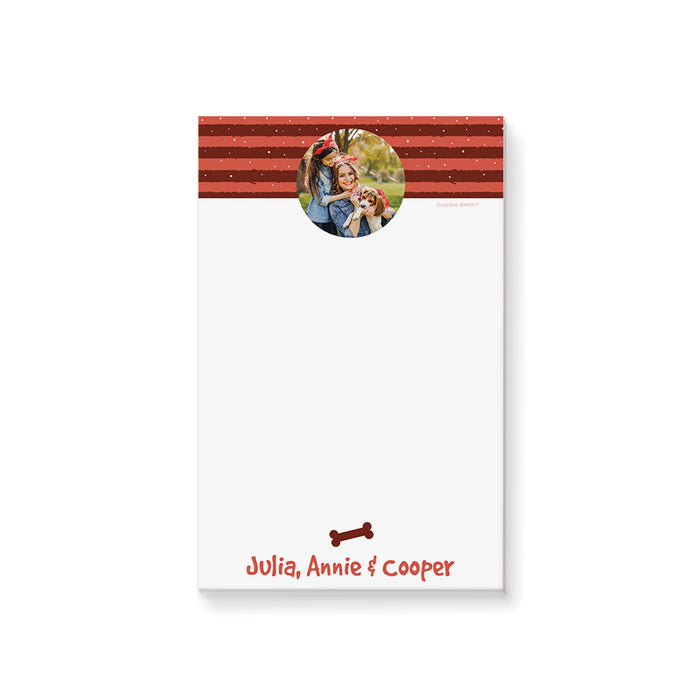 Personalized holiday notepad featuring a red striped header, custom photo, bone icon, and names at the bottom — an ideal gift for animal lovers during the holiday season.