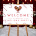 Holiday welcome sign featuring a family photo inside a heart-shaped candy cane frame with festive candy cane pattern and Christmas party welcome message.