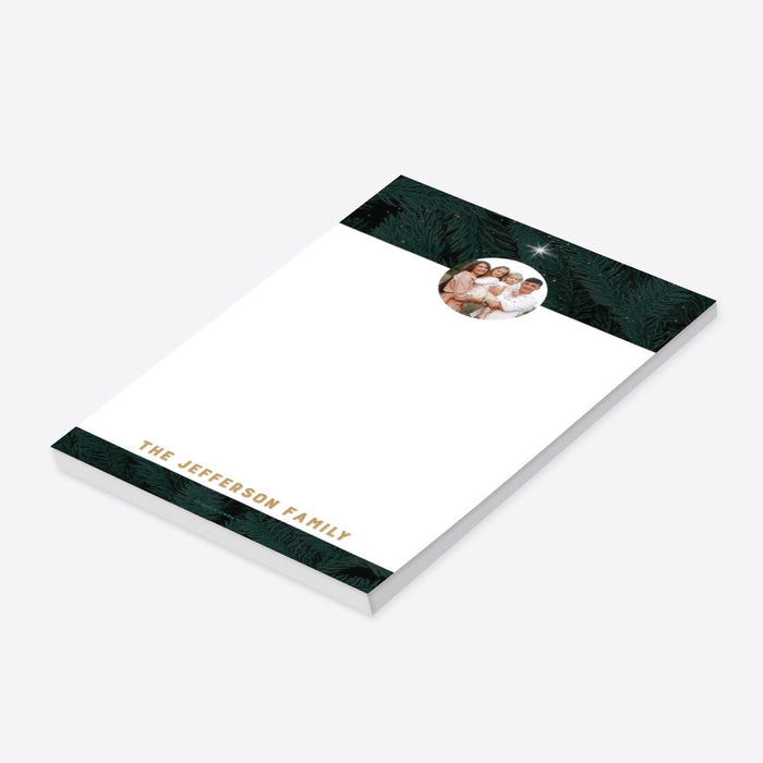 Personalized holiday notepad featuring a family photo and pine design, ideal for seasonal notes or as a gift.-side