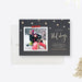 Elegant Happy Holidays photo card featuring a dark textured background, gold accent snowflakes and a framed family photo in a modern digital Christmas greeting design